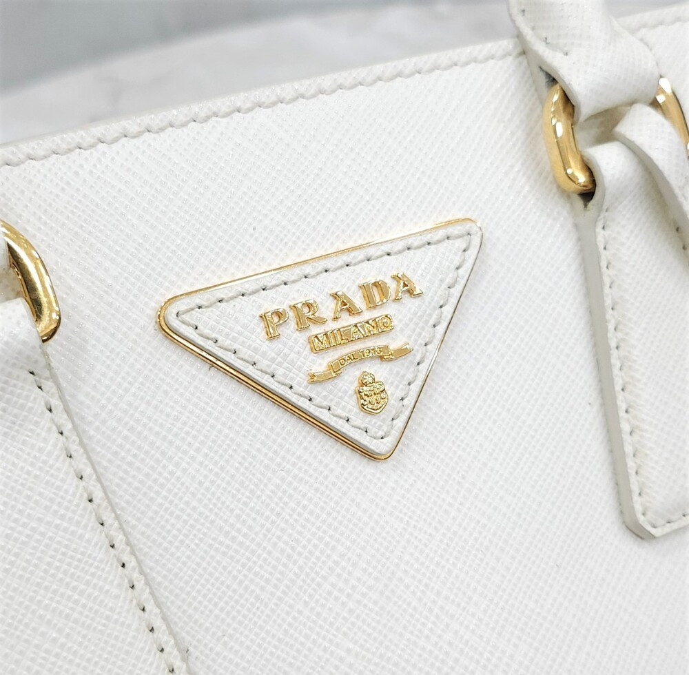 [럭스유] 프라다 화이트 사피아노 레더 미니 크로스백 1BA358