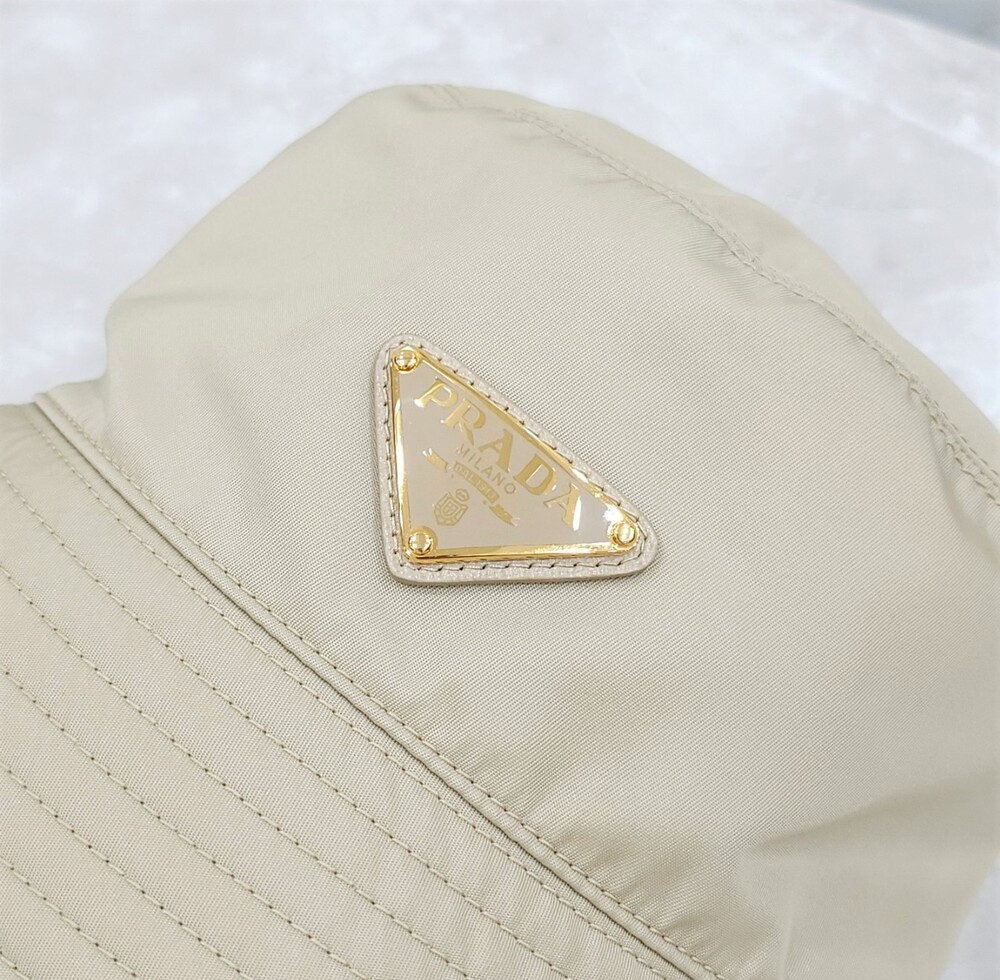 [럭스유] 프라다 삼각로고 리나일론 버킷햇 S