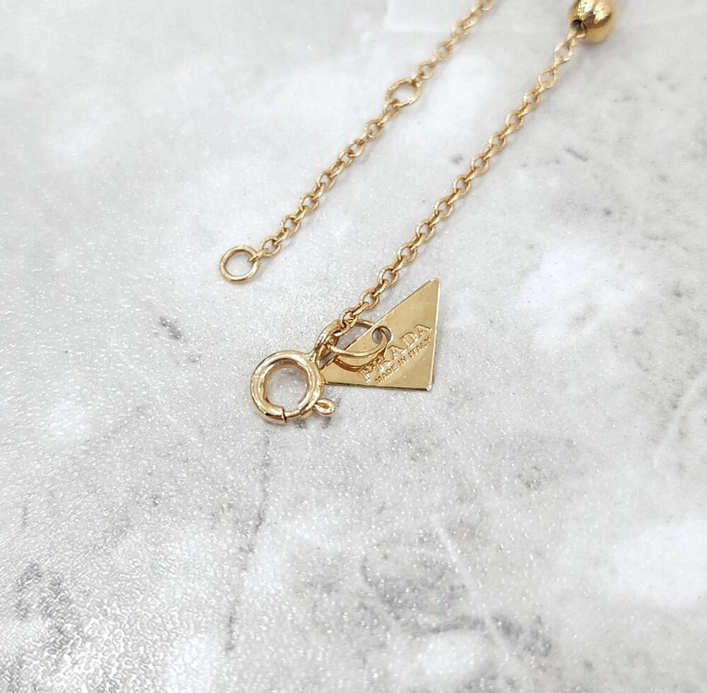 [럭스유] (새상품) 프라다 삼각로고 골드볼 목걸이