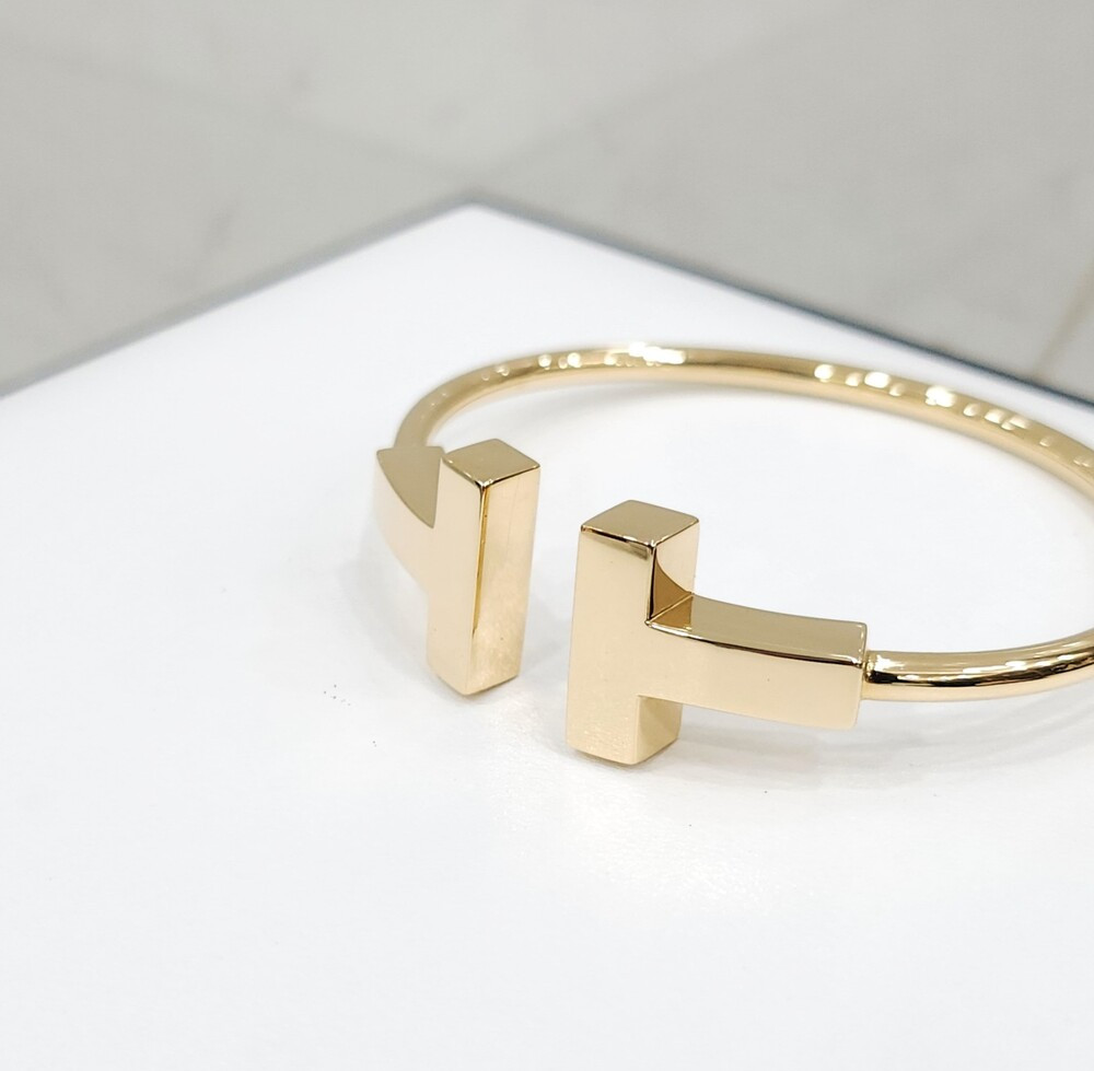 [럭스유] 티파니앤코 T 와이드 와이어 팔찌 18K 옐로우골드 S