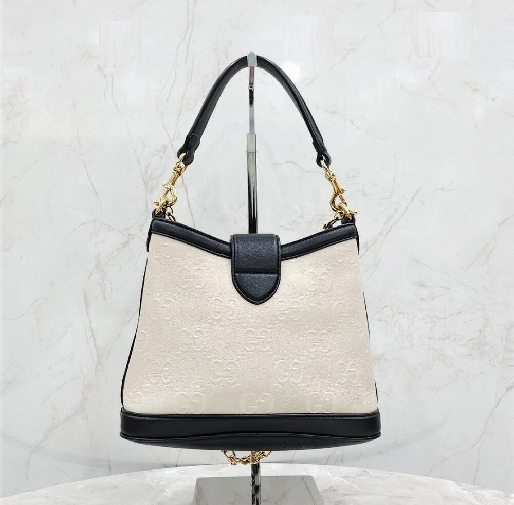 [럭스유] 구찌 GG 엠보스 스몰 레더 버킷 숄더백 675788